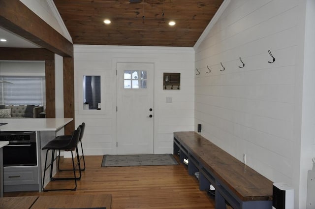 mudroom featuring ornamental molding, lofted ceiling, wood-type flooring, and wooden ceiling