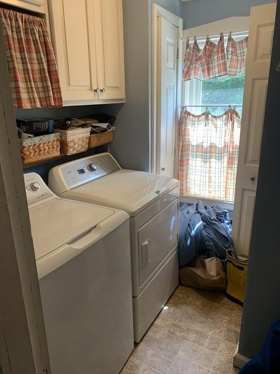 293 Washington, Warren, MA 01083 - washroom with cabinet space, washer and dryer, and plenty of natural light