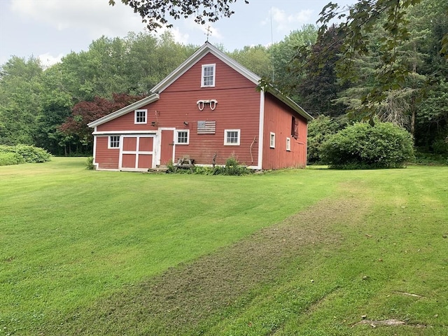 293 Washington, Warren, MA 01083 - view of property exterior with a yard and an outdoor structure