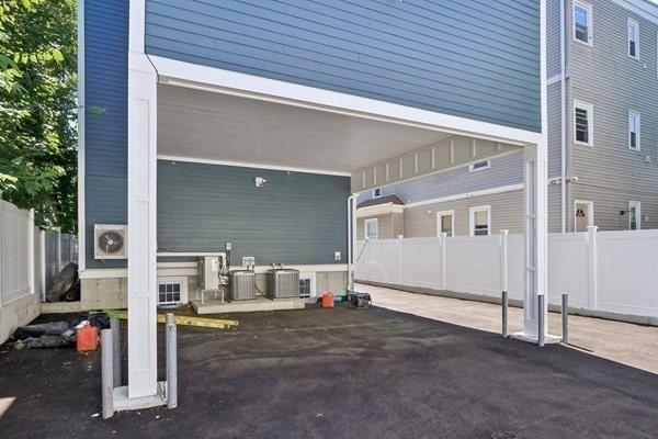 exterior space with a carport