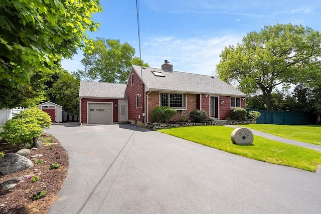 4 Farmland Rd, Saugus, MA 01906 - view of front of property with asphalt driveway, an attached garage, a chimney, brick siding, and roof with shingles