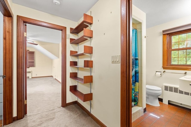 4 Farmland Rd, Saugus, MA 01906 - corridor featuring radiator, carpet, and baseboards
