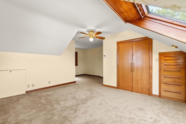 4 Farmland Rd, Saugus, MA 01906 - additional living space with carpet floors, lofted ceiling, a ceiling fan, a skylight, and baseboards