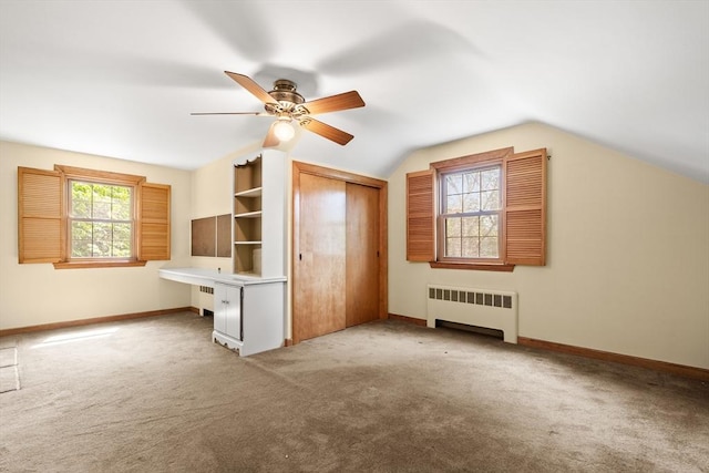 4 Farmland Rd, Saugus, MA 01906 - unfurnished bedroom with radiator heating unit, carpet floors, baseboards, vaulted ceiling, and a closet