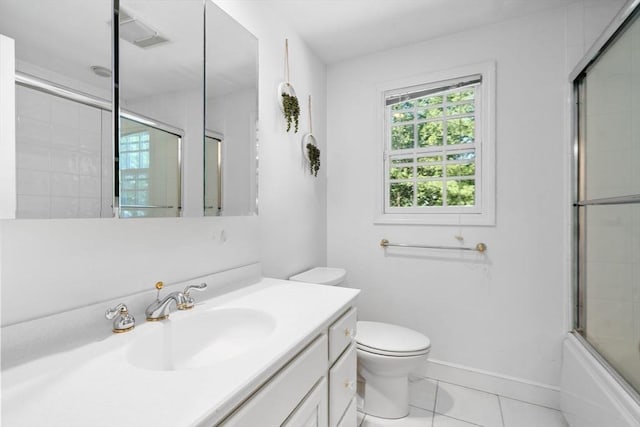 1 Pleasantview Ter, Framingham, MA 01701 - full bathroom with toilet, vanity, baseboards, combined bath / shower with glass door, and tile patterned floors