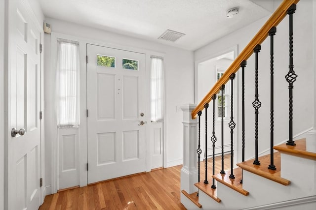 1 Pleasantview Ter, Framingham, MA 01701 - foyer with stairs and wood finished floors