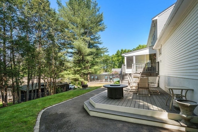 1 Pleasantview Ter, Framingham, MA 01701 - wooden terrace with stairway, a sunroom, and a lawn