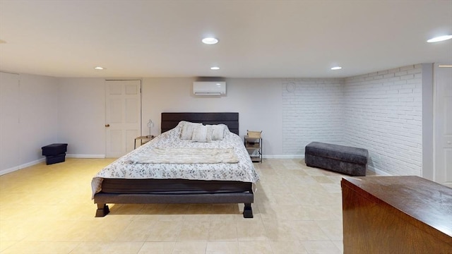 bedroom with a wall mounted air conditioner and brick wall