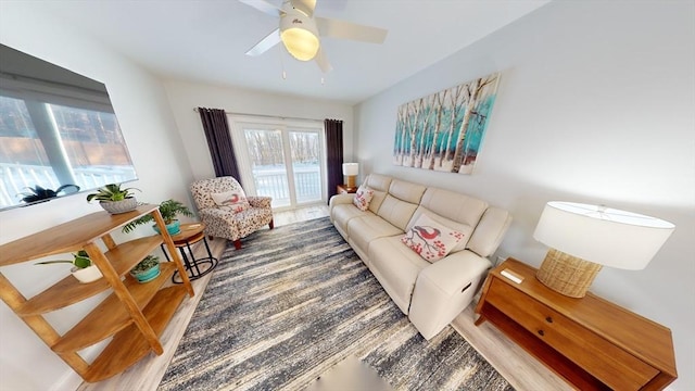 living room featuring ceiling fan