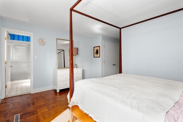 bedroom featuring baseboards