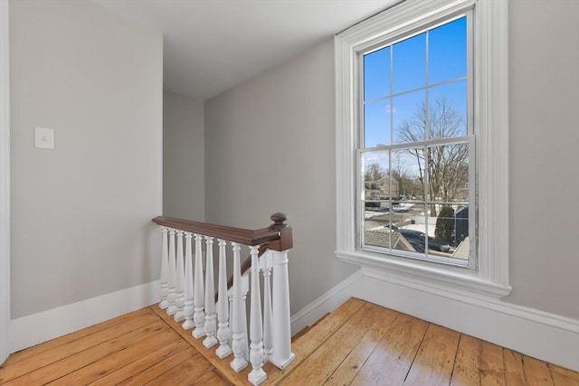 staircase featuring hardwood / wood-style floors