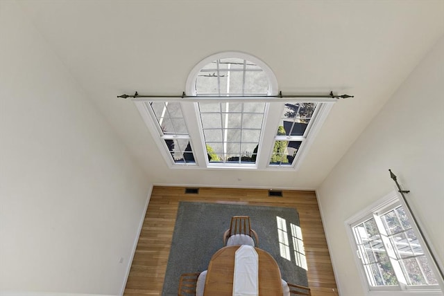 interior space featuring visible vents and wood finished floors