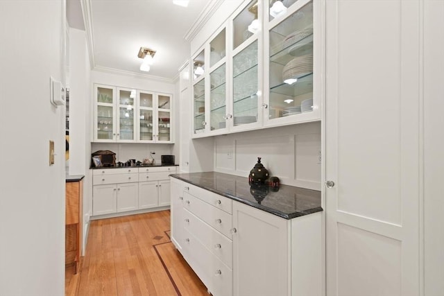 210 Melrose St, Newton, MA 02466 - bar featuring crown molding and light wood-type flooring