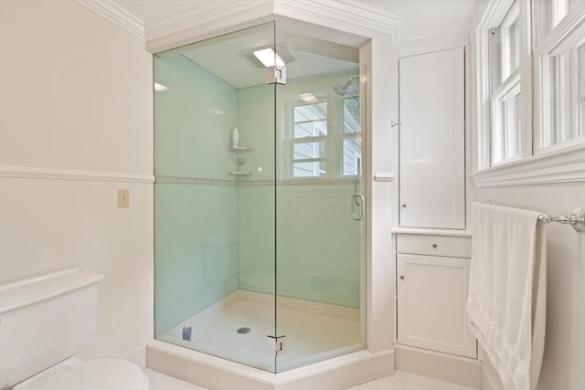 210 Melrose St, Newton, MA 02466 - bathroom with a shower stall, toilet, tile patterned flooring, and crown molding