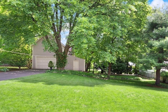 210 Melrose St, Newton, MA 02466 - view of yard featuring a garage and driveway