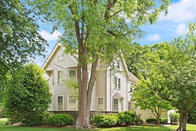210 Melrose St, Newton, MA 02466 - view of property exterior with a lawn
