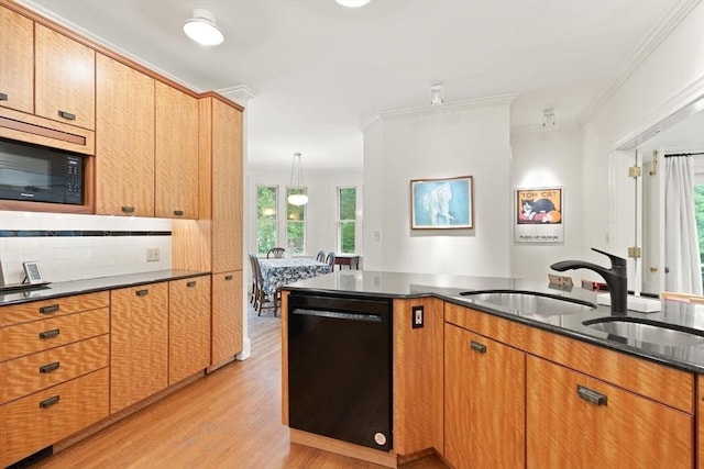 210 Melrose St, Newton, MA 02466 - kitchen featuring black appliances, light wood-style floors, dark stone counters, tasteful backsplash, and a sink