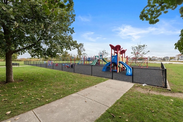 view of jungle gym with a lawn