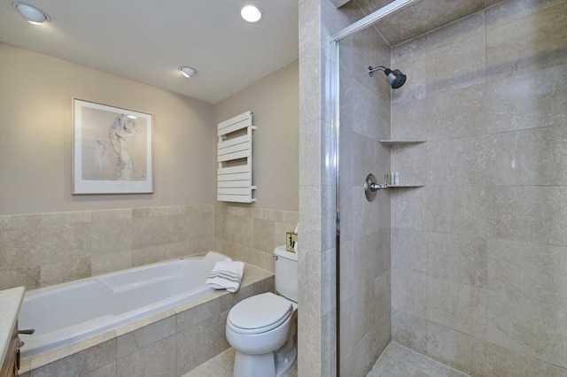 full bath featuring toilet, a shower stall, a garden tub, and recessed lighting