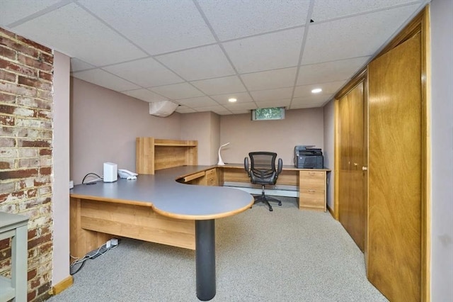 office featuring carpet, a paneled ceiling, and recessed lighting