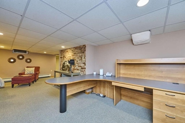 recreation room with a paneled ceiling, carpet, a baseboard radiator, baseboard heating, and a desk