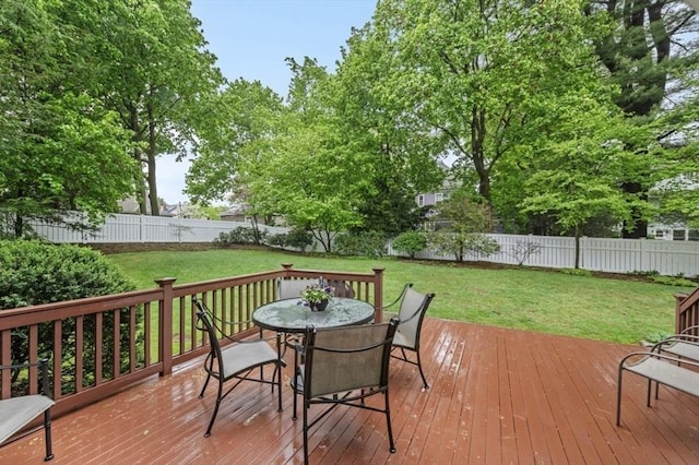 wooden deck with outdoor dining area
