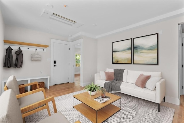 living room with light hardwood / wood-style flooring