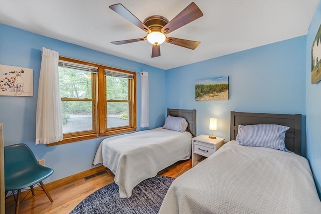 51 Wianno Cir, Barnstable, MA 02655 - bedroom with wood finished floors, baseboards, and ceiling fan