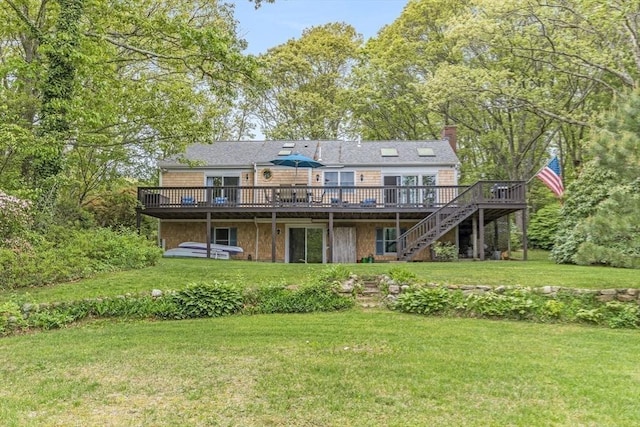 51 Wianno Cir, Barnstable, MA 02655 - rear view of house with a wooden deck, a yard, stairway, and a chimney