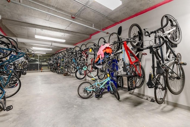 garage with bike storage and baseboards