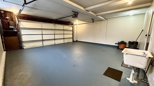 garage featuring a garage door opener