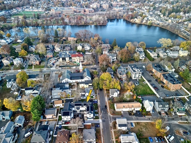 bird's eye view with a water view and a residential view