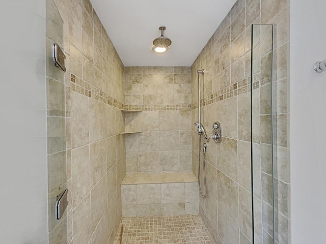 full bathroom featuring a stall shower