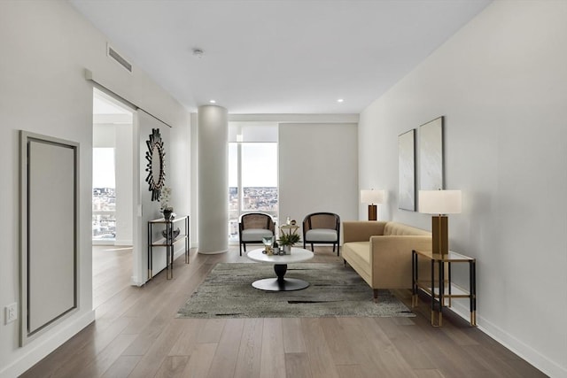 living area featuring hardwood / wood-style flooring