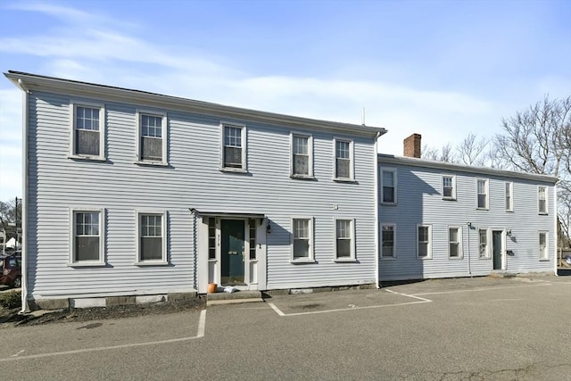 378-380 Neponset Ave, Boston, MA 02122 - view of front facade with a chimney and uncovered parking