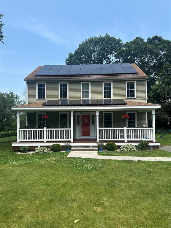 15 Rose Ln, Uxbridge, MA 01569 - farmhouse-style home featuring covered porch and a front lawn
