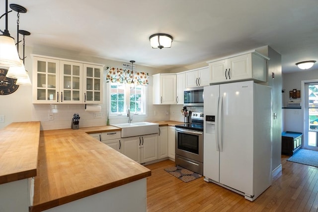 15 Rose Ln, Uxbridge, MA 01569 - kitchen with stainless steel appliances, butcher block counters, and light wood-type flooring