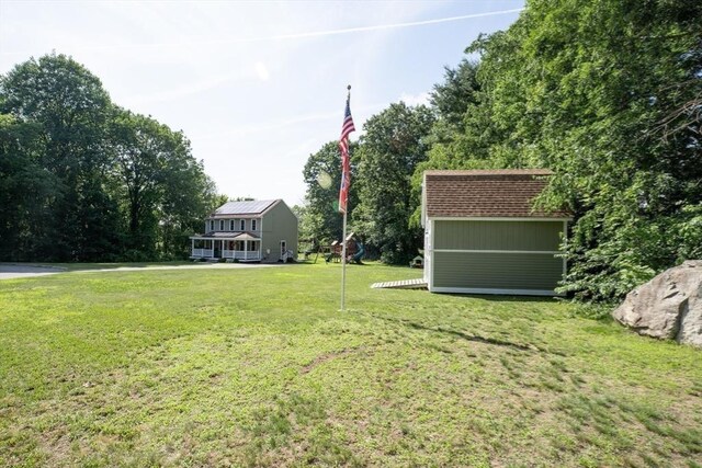 15 Rose Ln, Uxbridge, MA 01569 - view of green lawn with a shed