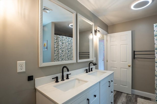15 Rose Ln, Uxbridge, MA 01569 - full bathroom featuring double vanity and wood finished floors