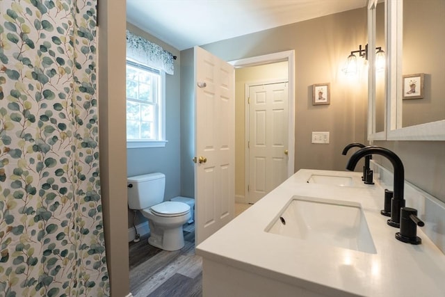 15 Rose Ln, Uxbridge, MA 01569 - full bath with double vanity and wood finished floors