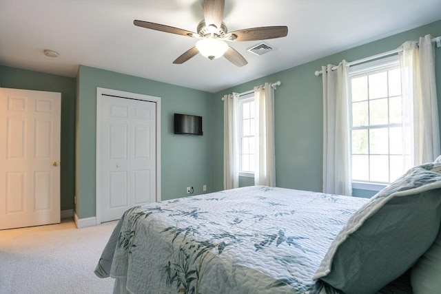 15 Rose Ln, Uxbridge, MA 01569 - bedroom featuring light colored carpet, a closet, and ceiling fan