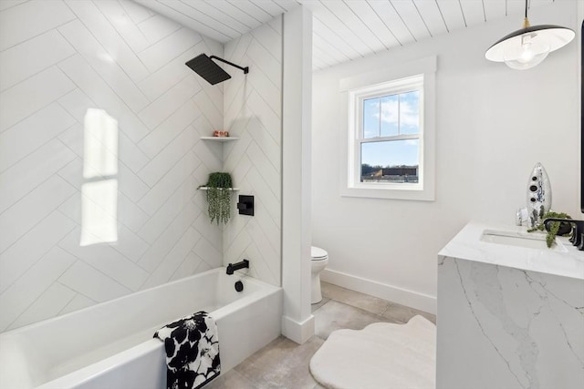 bathroom with tile patterned flooring, baseboards, toilet, shower / bathtub combination, and vanity