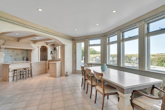 tiled dining area with sink