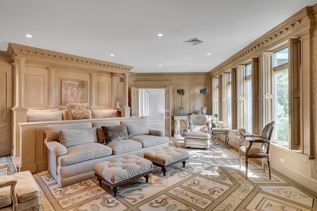 living room featuring decorative columns