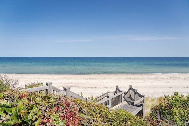 property view of water featuring a beach view