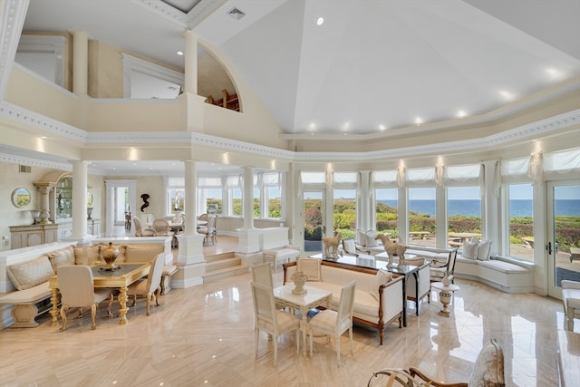 interior space featuring french doors and decorative columns