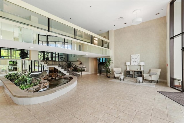 1 Loring Ave Unit 206, Swampscott, MA 01907 - community lobby with a high ceiling and stairway