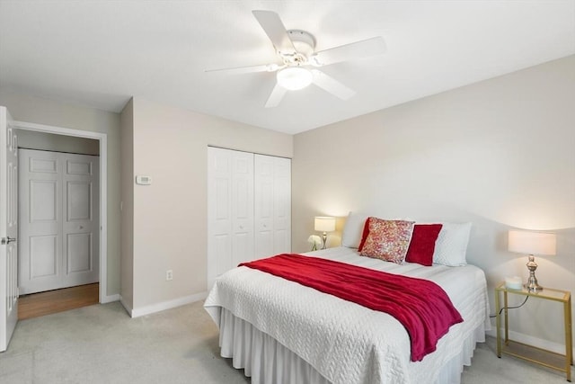 1 Loring Ave Unit 206, Swampscott, MA 01907 - bedroom with a closet, light carpet, baseboards, and ceiling fan