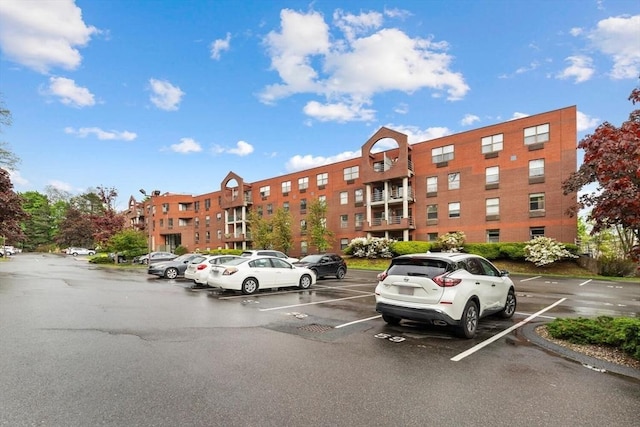 1 Loring Ave Unit 206, Swampscott, MA 01907 - view of apartment building / complex with uncovered parking