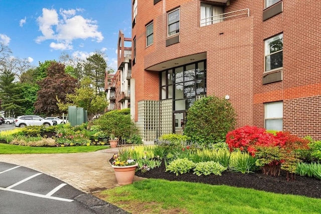 1 Loring Ave Unit 206, Swampscott, MA 01907 - view of building exterior with uncovered parking